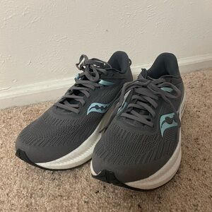 Never been worn Saucony running shoes